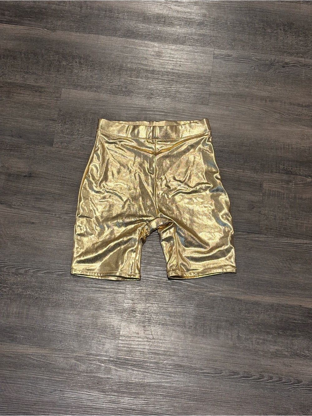 Gold SKIMS shorts